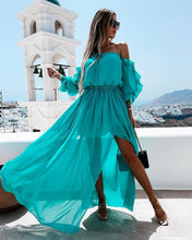 Load image into Gallery viewer, Woman wearing long aqua color sheer dress with sleeves