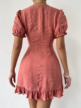 Load image into Gallery viewer, Woman wearing short dusty rose color wrap dress