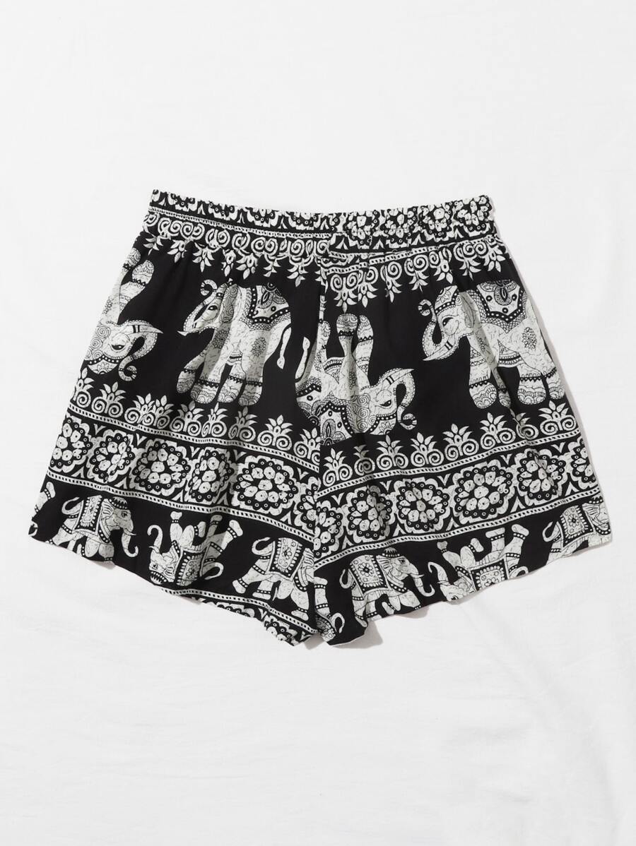 Black and white shorts with elephants print