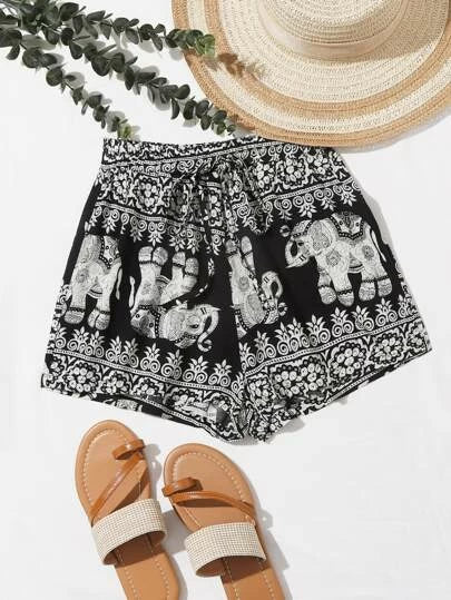 Black and white shorts with elephants print