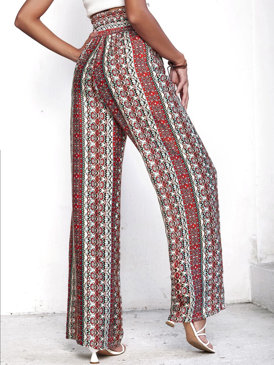 Woman wearing multicolor loose pants with boho design