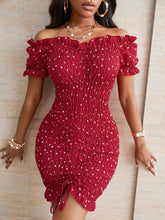 Load image into Gallery viewer, Woman wearing off-shoulder red dress with white polka dots 