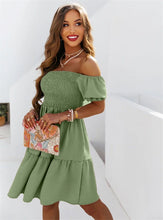 Load image into Gallery viewer, Woman wearing off-shoulder short flowy green dress  Edit alt text