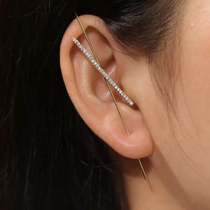 Woman wearing wrap hook earring with rhinestones