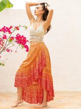 Load image into Gallery viewer, Woman wearing long orange flowy boho skirt