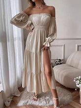 Load image into Gallery viewer, Woman wearing beige off-shoulder long sleeve flowy dress