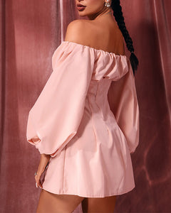 Woman wearing pink off-shoulder short dress