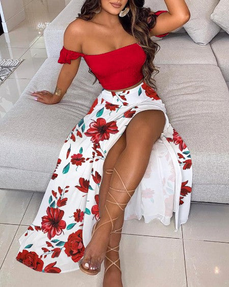 Woman wearing red off-shoulder top and long white skirt with red flowers