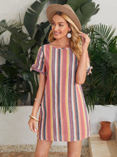 Load image into Gallery viewer, Woman wearing short multicolor stripe dress
