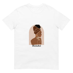 White t-shirt that has a woman on it and says "Herbalist"